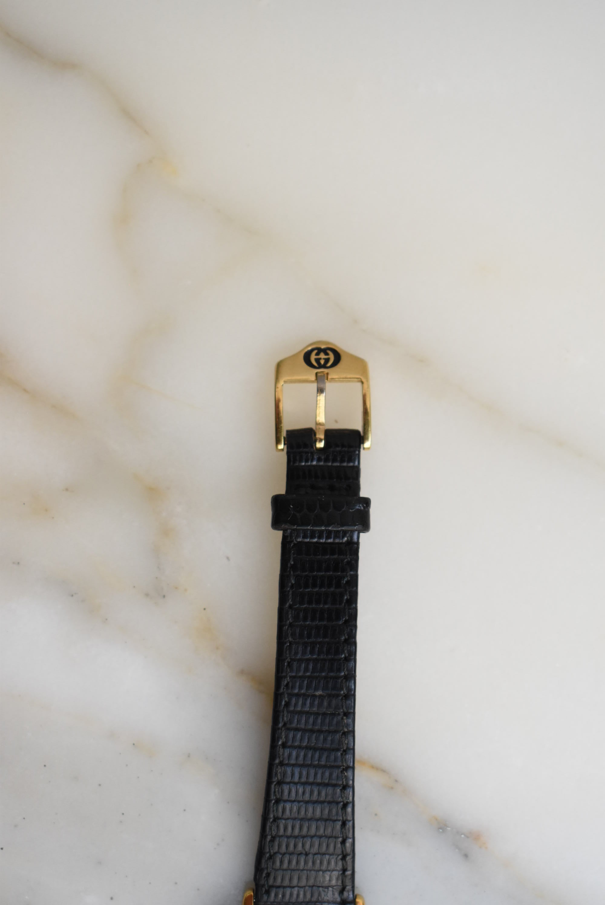 Gucci Small Black And Gold Watch