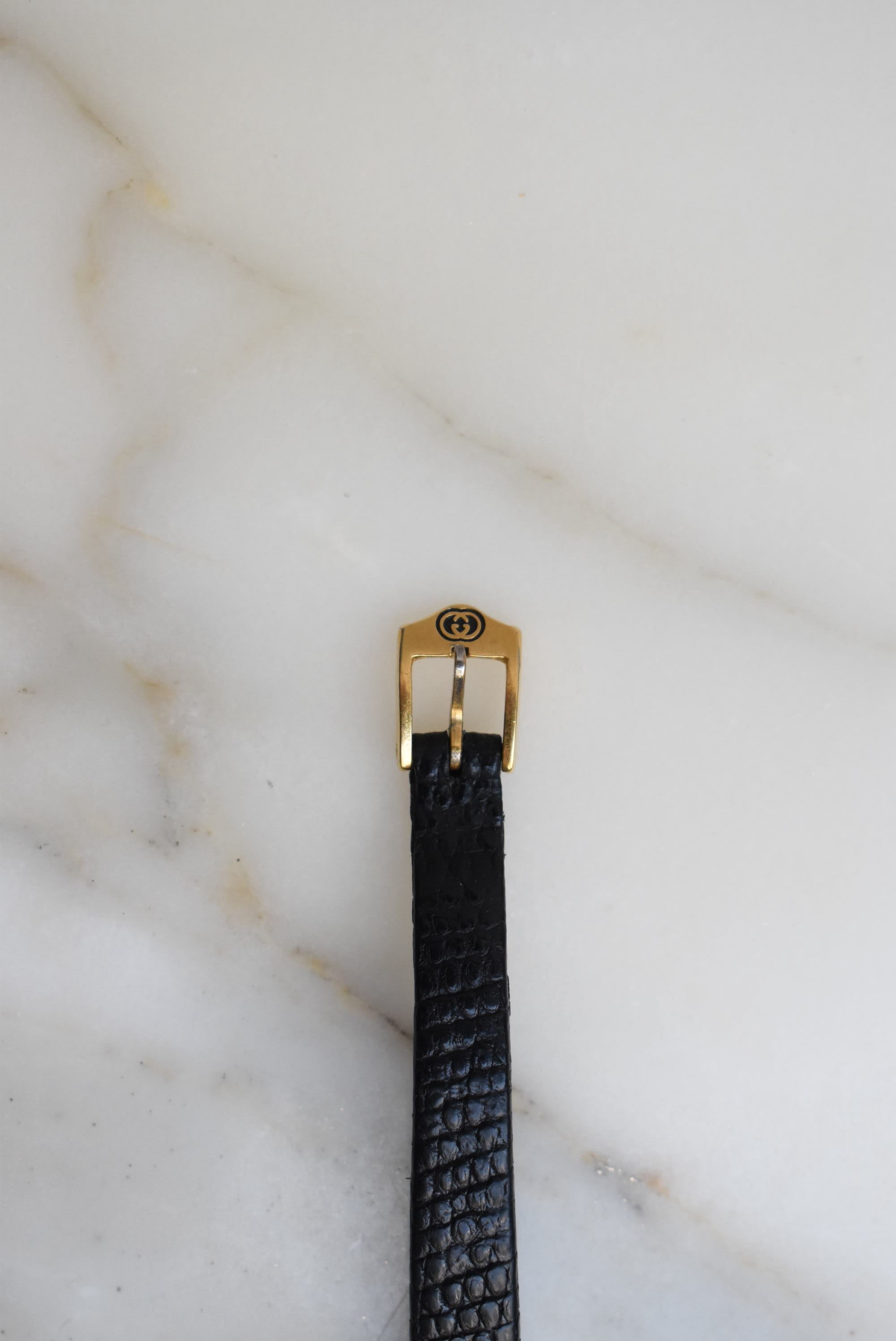 Gucci Black And Gold Watch