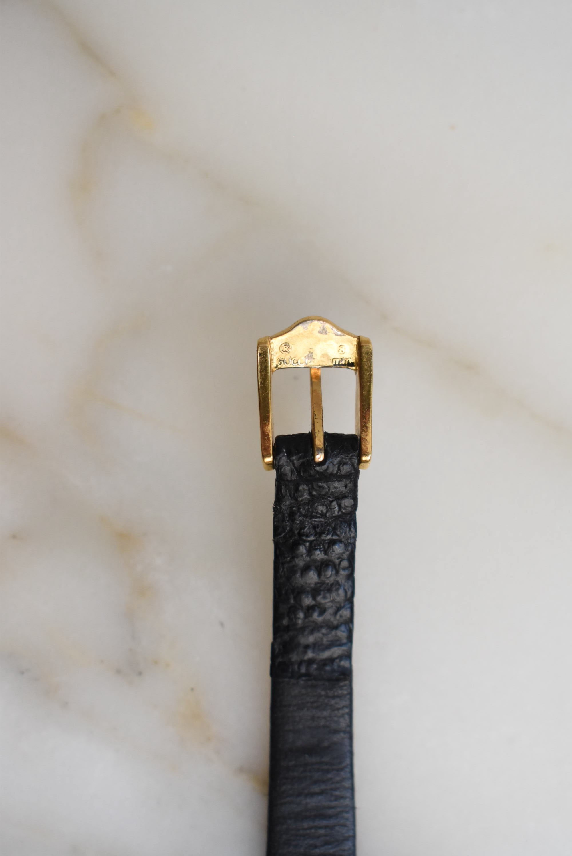 Gucci Black And Gold Watch